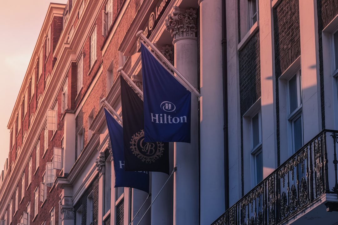 Hilton hotel flags on building exterior