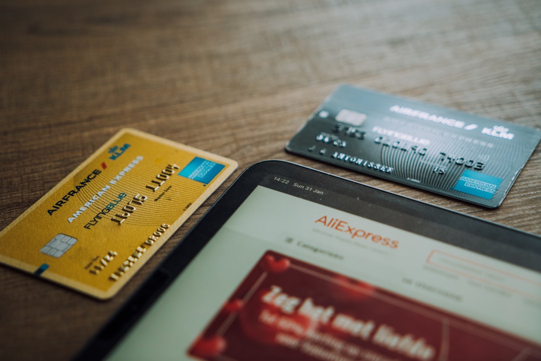 Visa card on brown wooden table